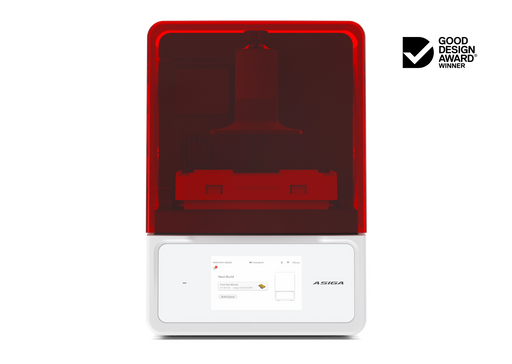 A front view of the Asiga Max 2 3D printer featuring a translucent red top hood, closed, with a filtered view of the build plate and material tray, and a white lower control panel featuring a touchscreen interface, shown on a solid white background with a Good Design Award 2024 badge in the top right corner.