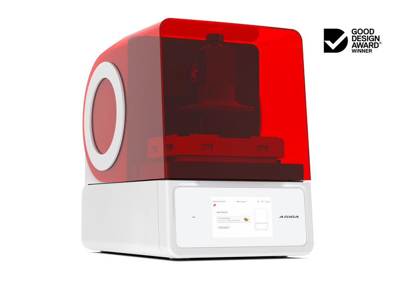 An offset left front view of the Asiga Max 2 3D printer featuring a translucent red top chamber and a white lower control panel featuring a touchscreen interface, shown on a solid white background with a Good Design Award 2024 badge in the top right corner.