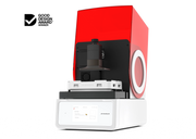 An offset right front view of the Asiga Max 2 3D printer featuring a translucent red top hood, open showing the build plate and material tray view, and a white lower control panel featuring a touchscreen interface, shown on a solid white background with a Good Design Award 2024 badge in the top right corner.