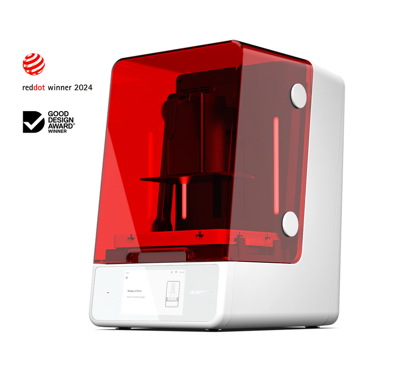 An offset front right view of the Asiga Ultra 3D printer with award accolades reddot winner 2024 and Good Design Award