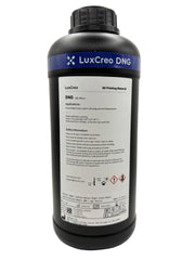 A rear view of LuxCreo DNG Dental Night Guard dental resin in a black 1kg bottle, featuring application information and safety information recommendation.