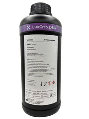 A rear view of 1 kg bottle of LuxCreo DSG Dental Surgical Guide translucent light violet dental resin, featuring a black bottle with a purple and white label. With application information and safety information recommendation.