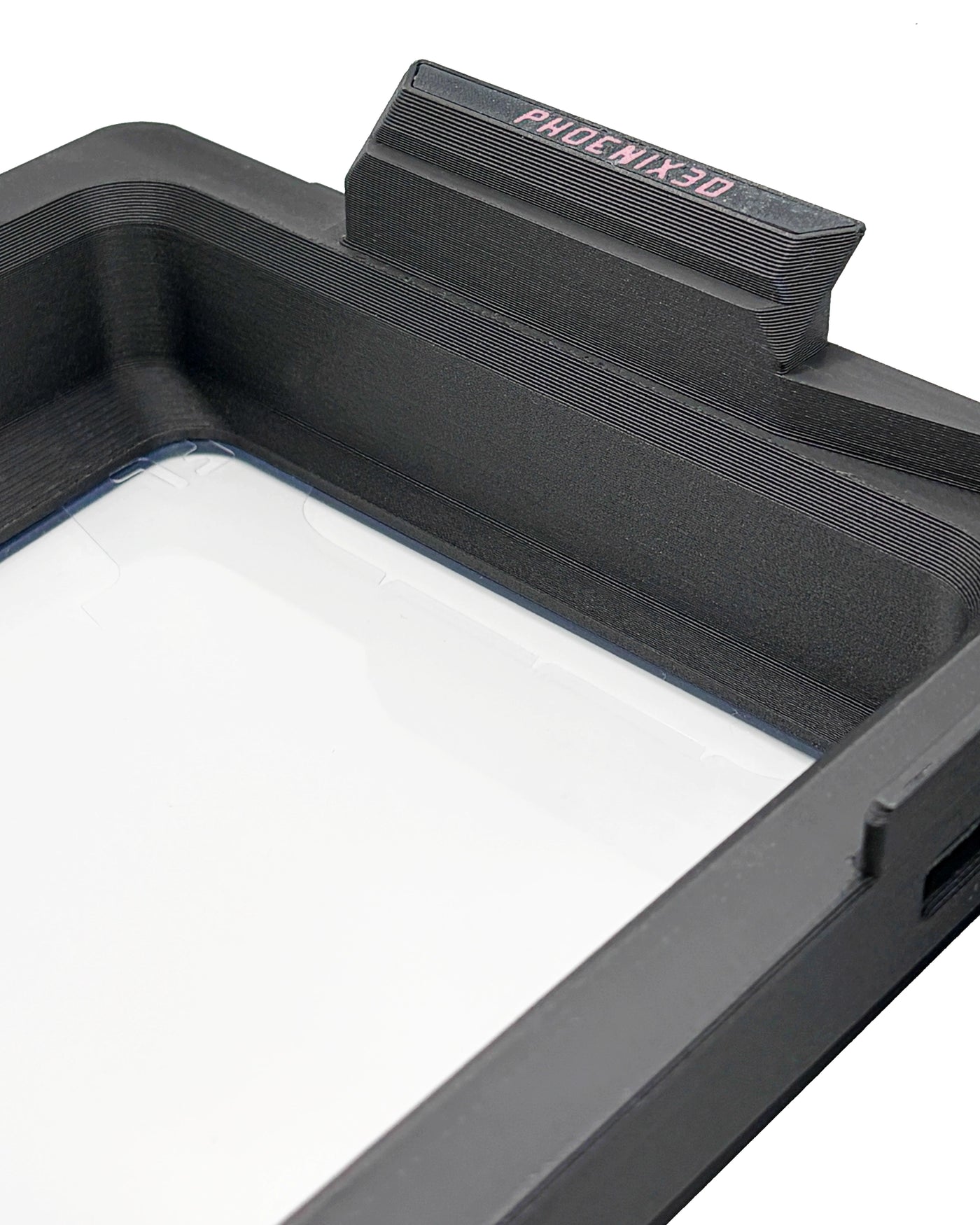 An offset, editorial view of a Phoenix Echo resin tray, a compatible replacement part for the Desktop Health Einstein.