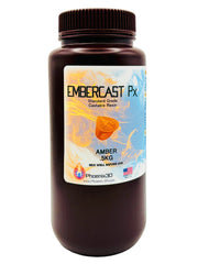 A front view of 5kg bottle of Phoenix3D EmberCast Px Standard Grade Castable Resin in Amber color, featuring a dark amber-brown bottle with a ribbed black cap and a white label with orange and blue graphics.
