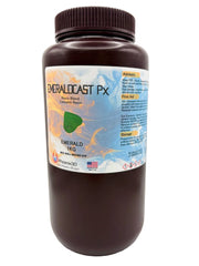 An offset view of EMERALCAST Px in a dark brown plastic bottle with a ribbed brown cap, featuring a detailed product label with blue, yellow, and orange graphics, set against a plain white background.