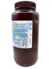 An offset view of Exact Px Beige featuring a brown 1kg bottle with a ribbed plastic cap and general advisory, first aid and storage requirements.