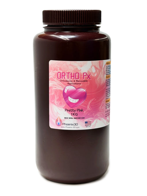 A 1KG bottle of Ortho Px Pretty Pink Orthodontic & Removable Appliances 3D Printing resin, featuring a dark brown bottle and a pink label with a heart graphic, on a white background.

